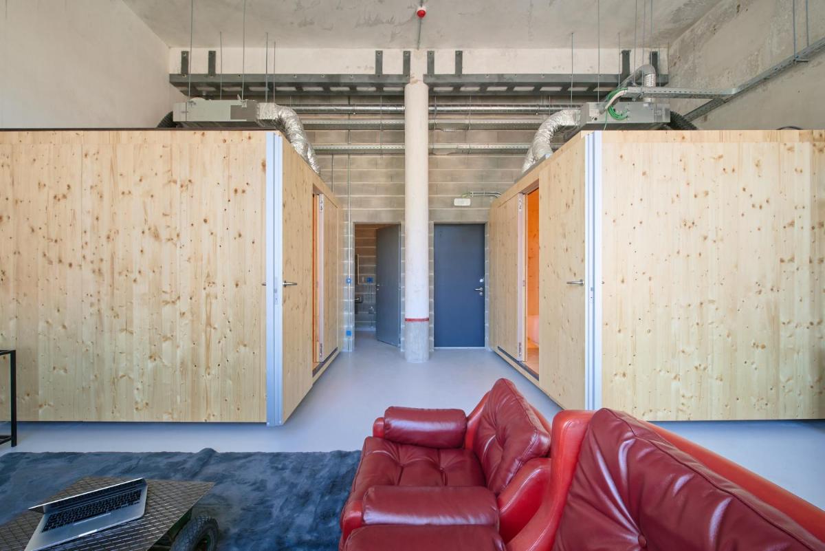 Uma área de estar em Moagem Industrial Lodge