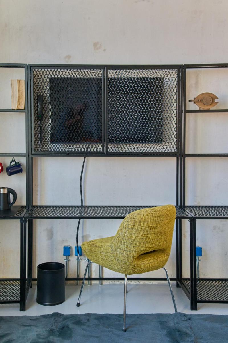Uma televisão e/ou sistema de entretenimento em Moagem Industrial Lodge