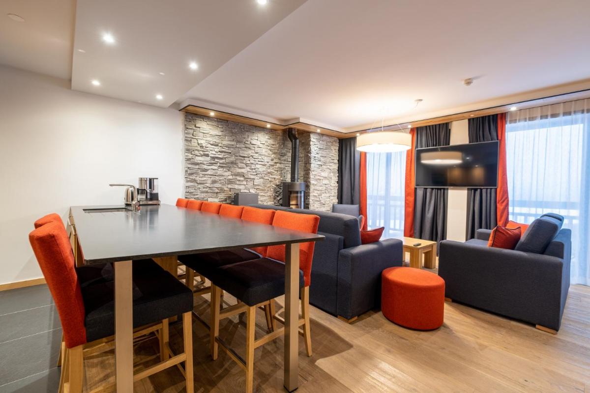 Cuisine ou kitchenette dans l'établissement Hôtel Alparena & Spa - 4 étoiles