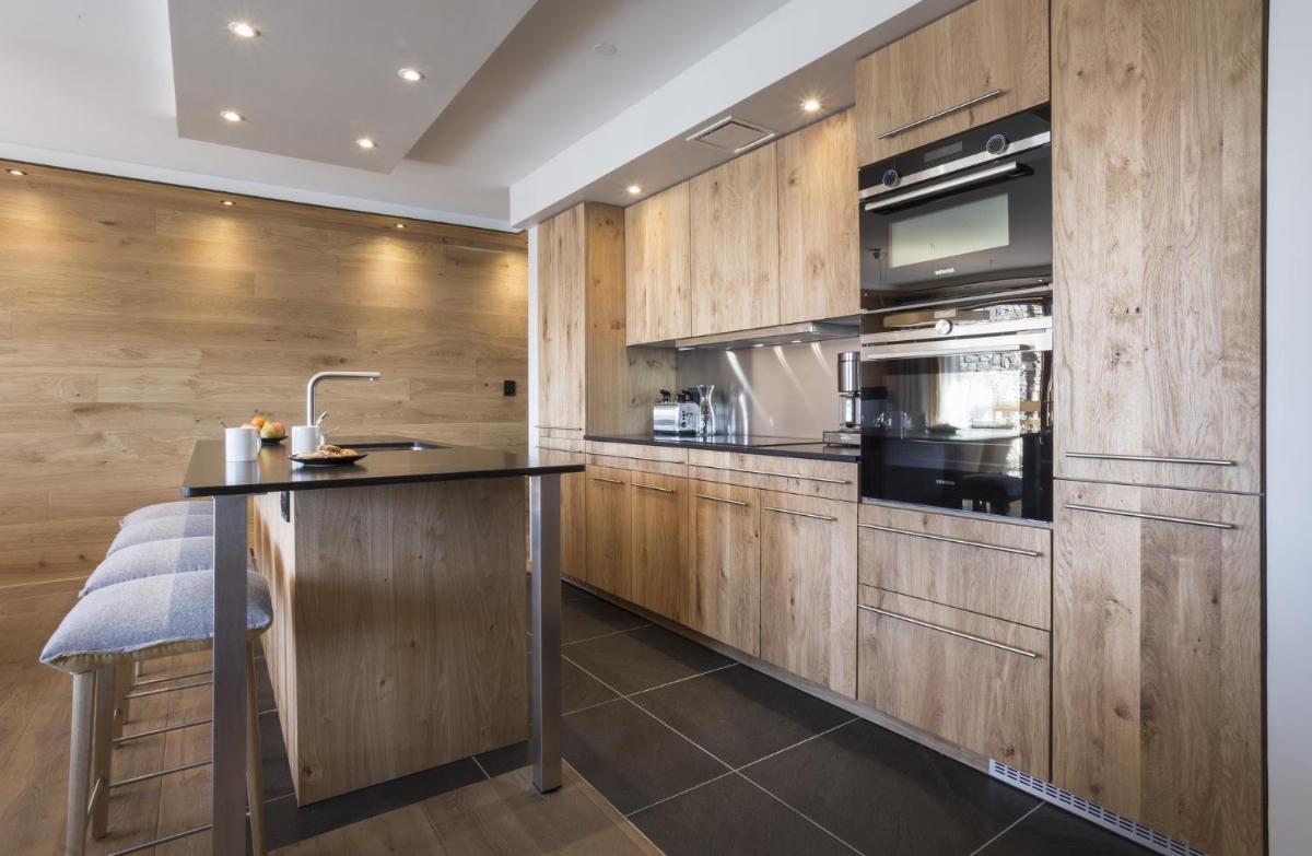 Cuisine ou kitchenette dans l'établissement Hôtel Alparena & Spa - 4 étoiles