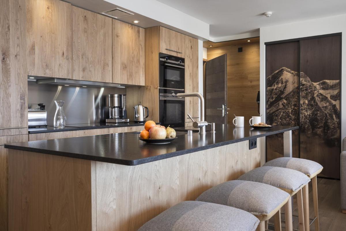 Cuisine ou kitchenette dans l'établissement Hôtel Alparena & Spa - 4 étoiles