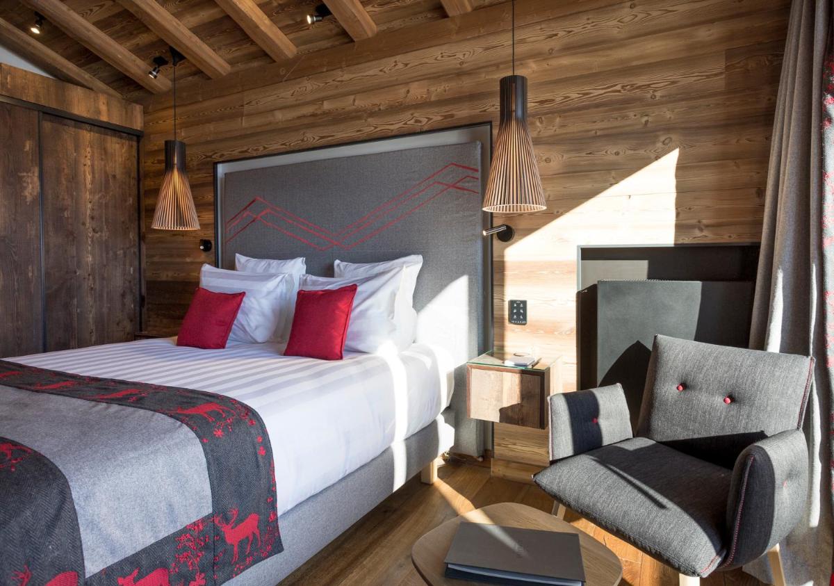 Un ou plusieurs lits dans un hébergement de l'établissement Hôtel Alparena & Spa - 4 étoiles