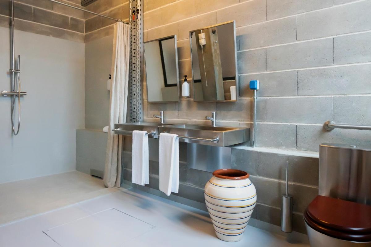 Uma casa de banho em Moagem Industrial Lodge