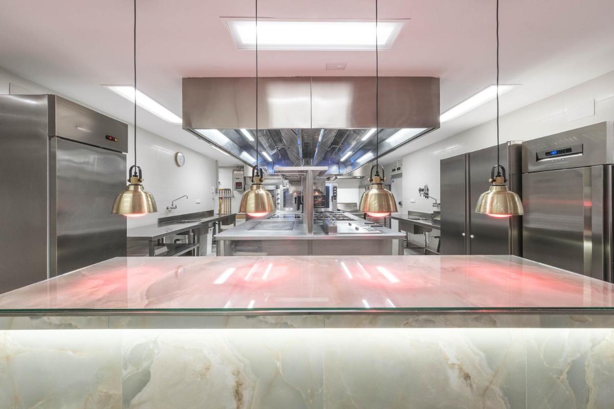 Una cocina o zona de cocina en Hotel Montecarlo Spa & Wellness