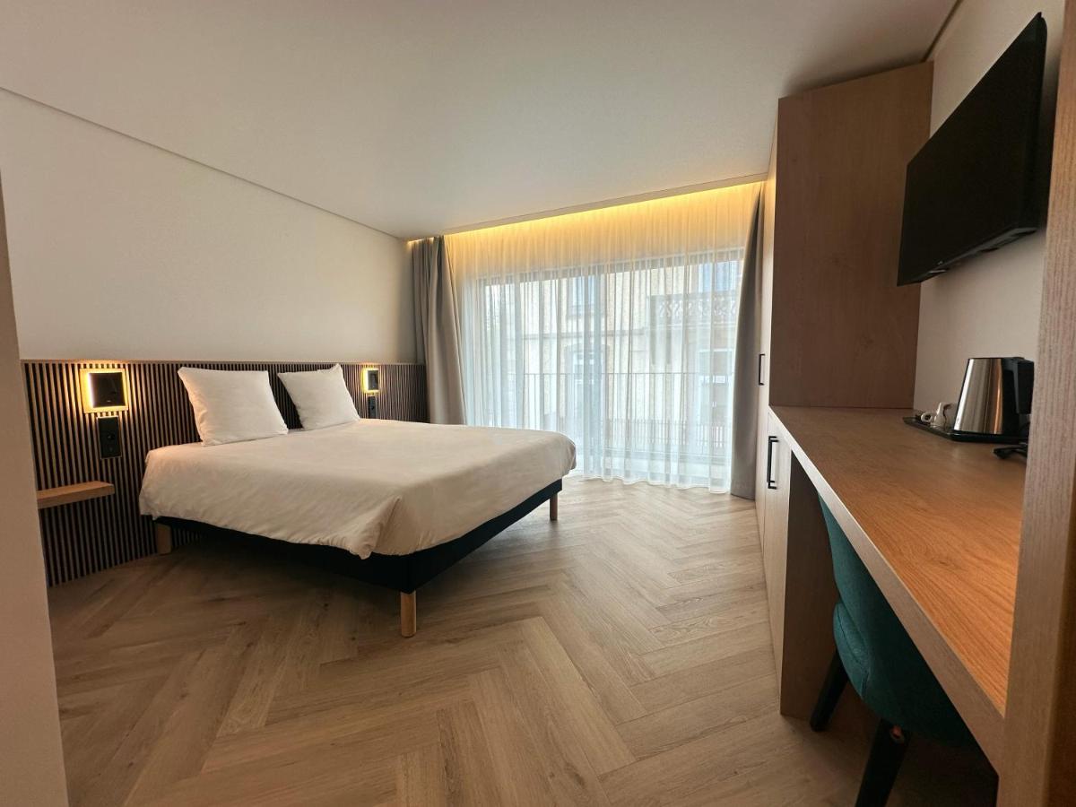 Brit Hotel Grand Hotel Munster - Housity
