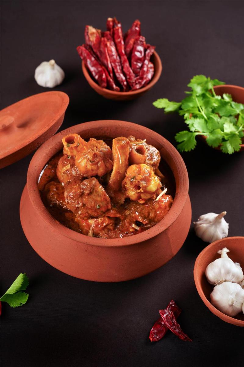 a bowl of food sitting on top of a table at Radisson Blu Hotel New Delhi Dwarka in New Delhi a bowl of food sitting on top of a table at Radisson Blu Hotel New Delhi Dwarka in New Delhi