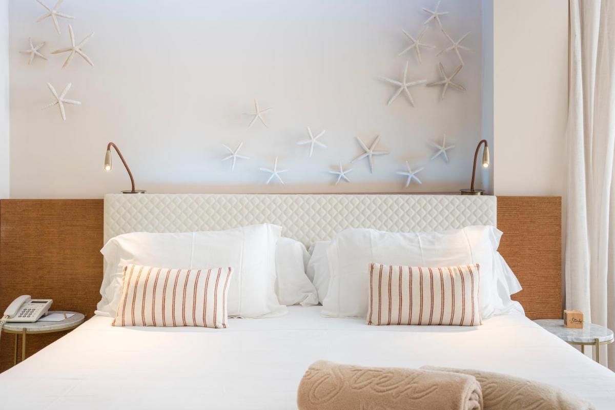 Cama o camas de una habitación en Melbeach Hotel & Spa - Adults Only