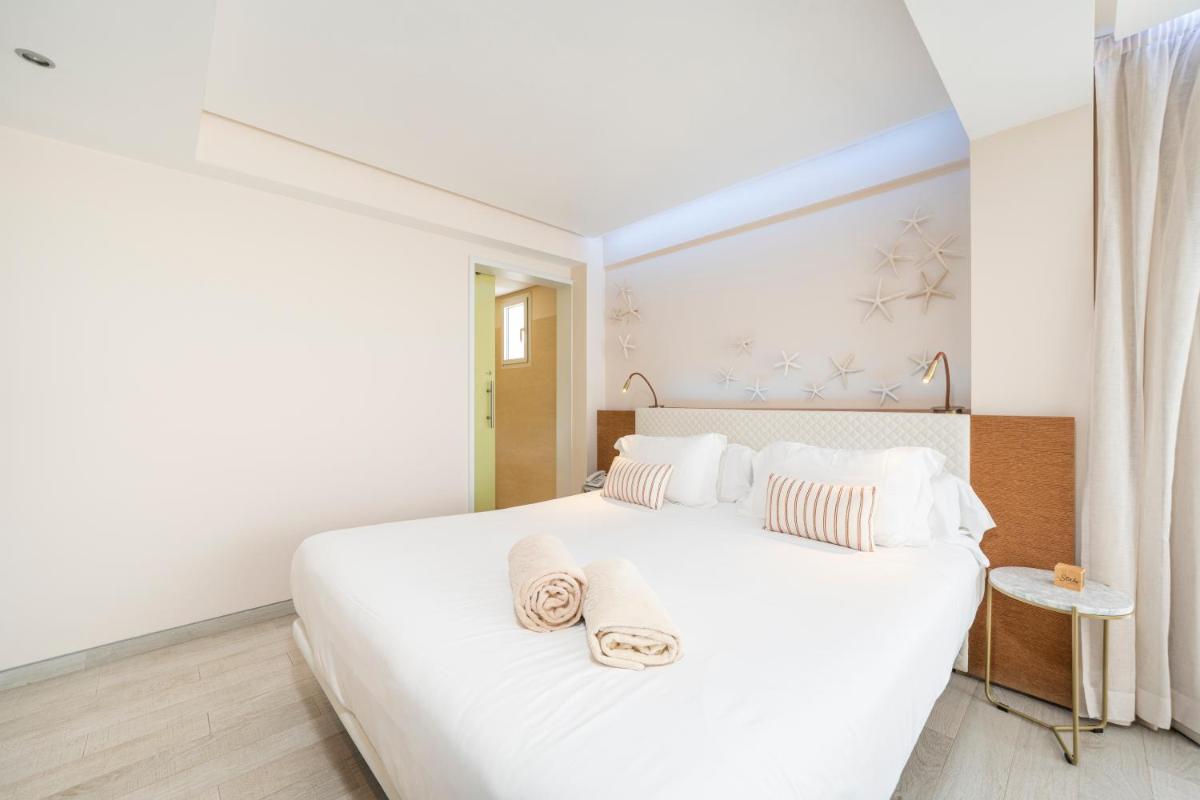 Cama o camas de una habitación en Melbeach Hotel & Spa - Adults Only