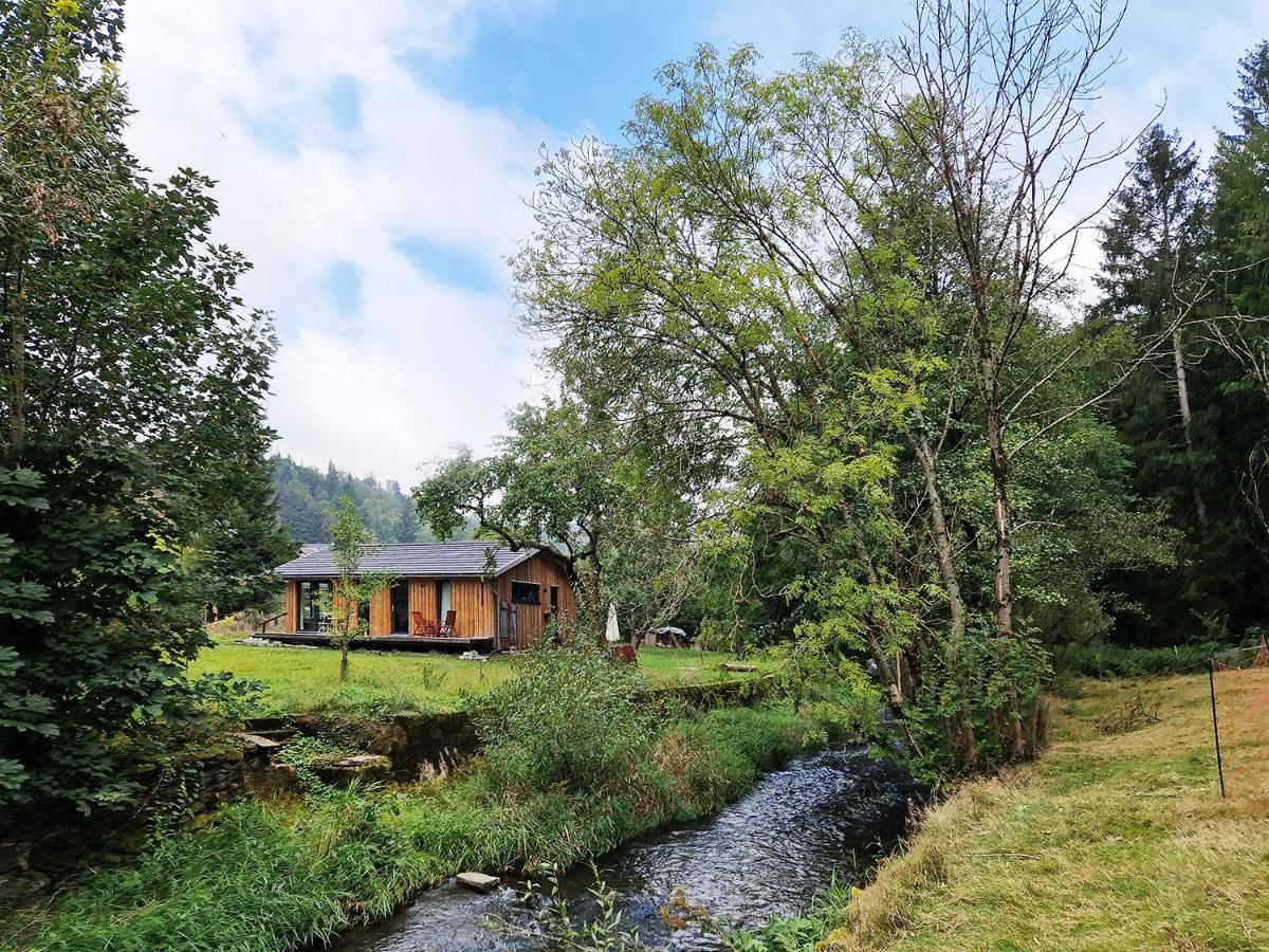 Holzhaus mit Kamin - Am Forellenfluss - Housity