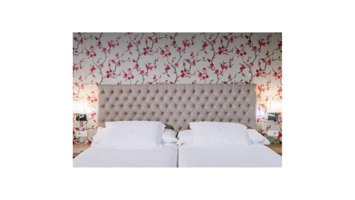 Cama o camas de una habitación en U-Hotel Spa Ciudad de Astorga