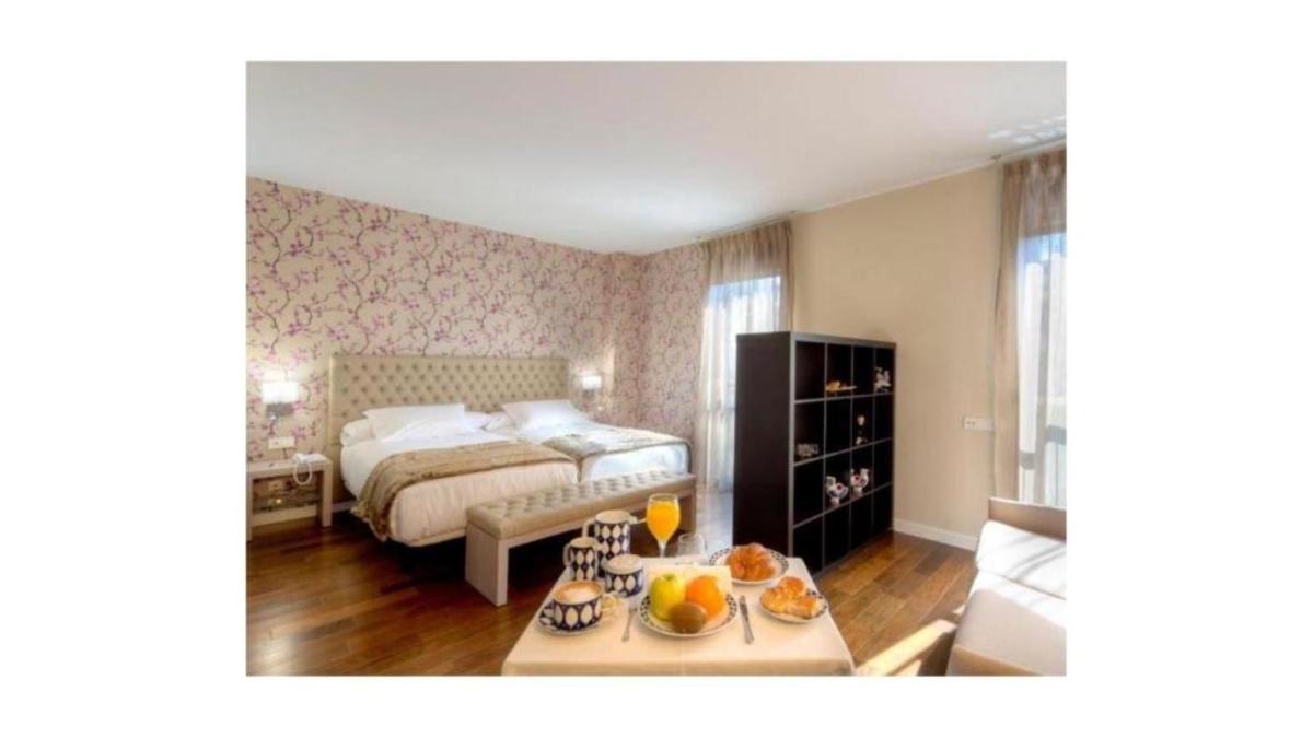 Cama o camas de una habitación en U-Hotel Spa Ciudad de Astorga