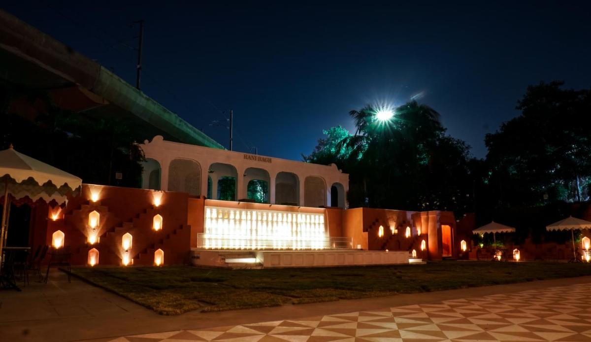a building with lights on it at night at Clarks Avadh in Lucknow