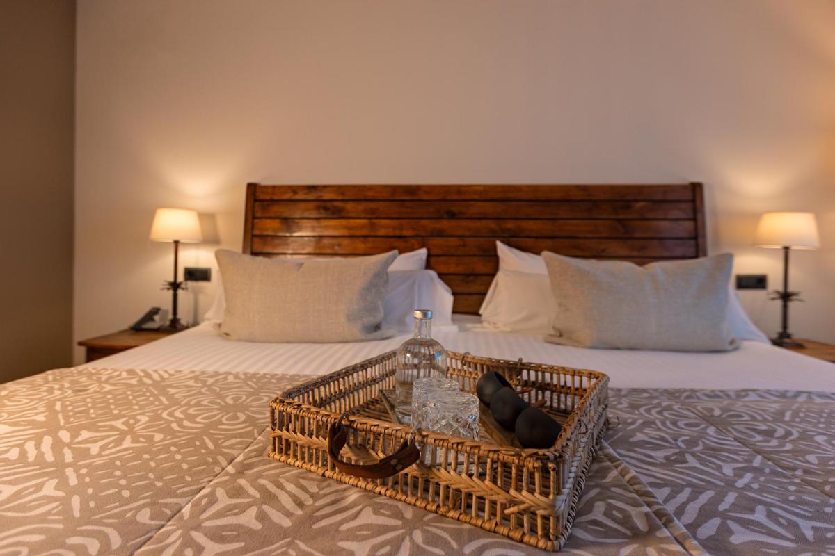 Cama o camas de una habitación en SWISS MORAIRA HOTEL & SPA - Adults only