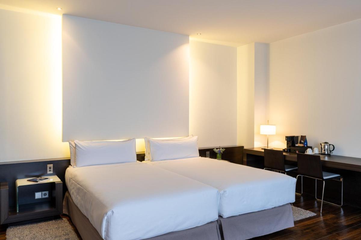 Cama o camas de una habitación en Parador de Alcalá de Henares