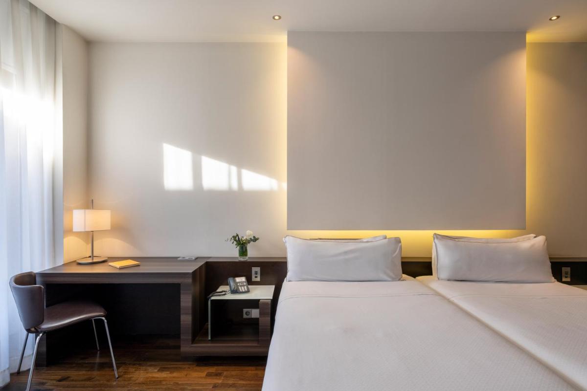Cama o camas de una habitación en Parador de Alcalá de Henares