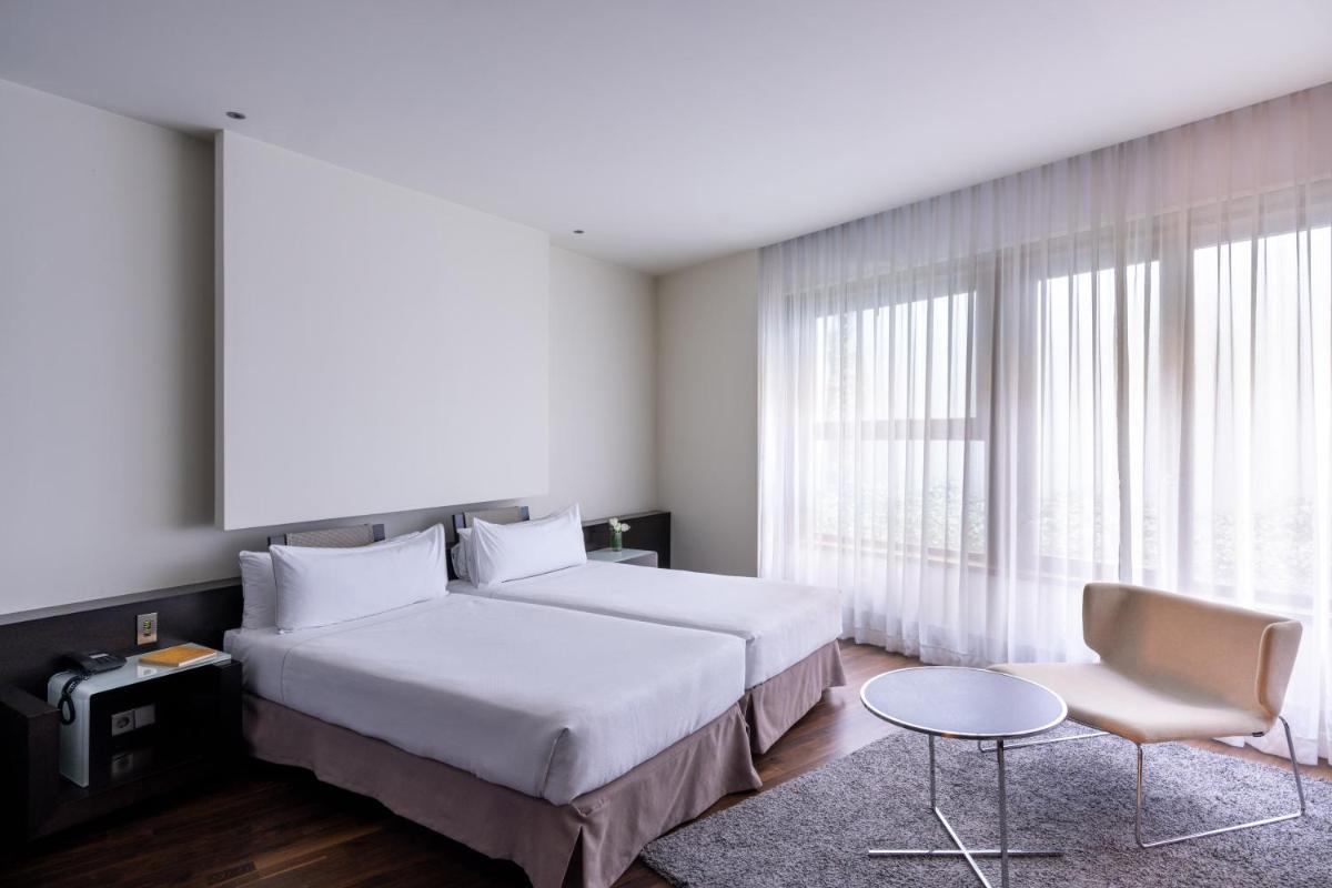 Cama o camas de una habitación en Parador de Alcalá de Henares