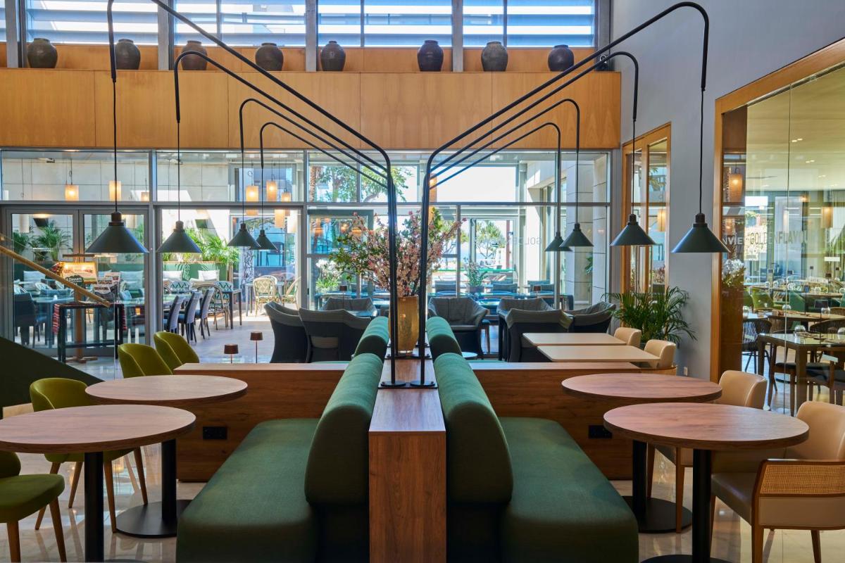 Um restaurante ou outro lugar para comer em Golden Residence Hotel