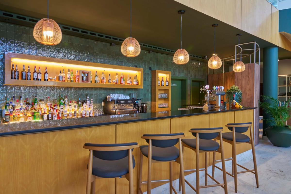 A área de bar ou lounge em Golden Residence Hotel