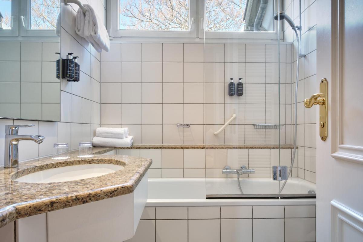 Salle de bains dans l'établissement Hotel & Spa A la cour d'Alsace by HappyCulture