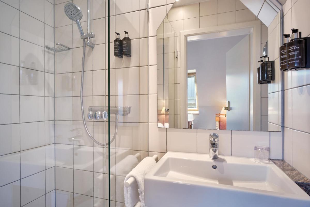 Salle de bains dans l'établissement Hotel & Spa A la cour d'Alsace by HappyCulture