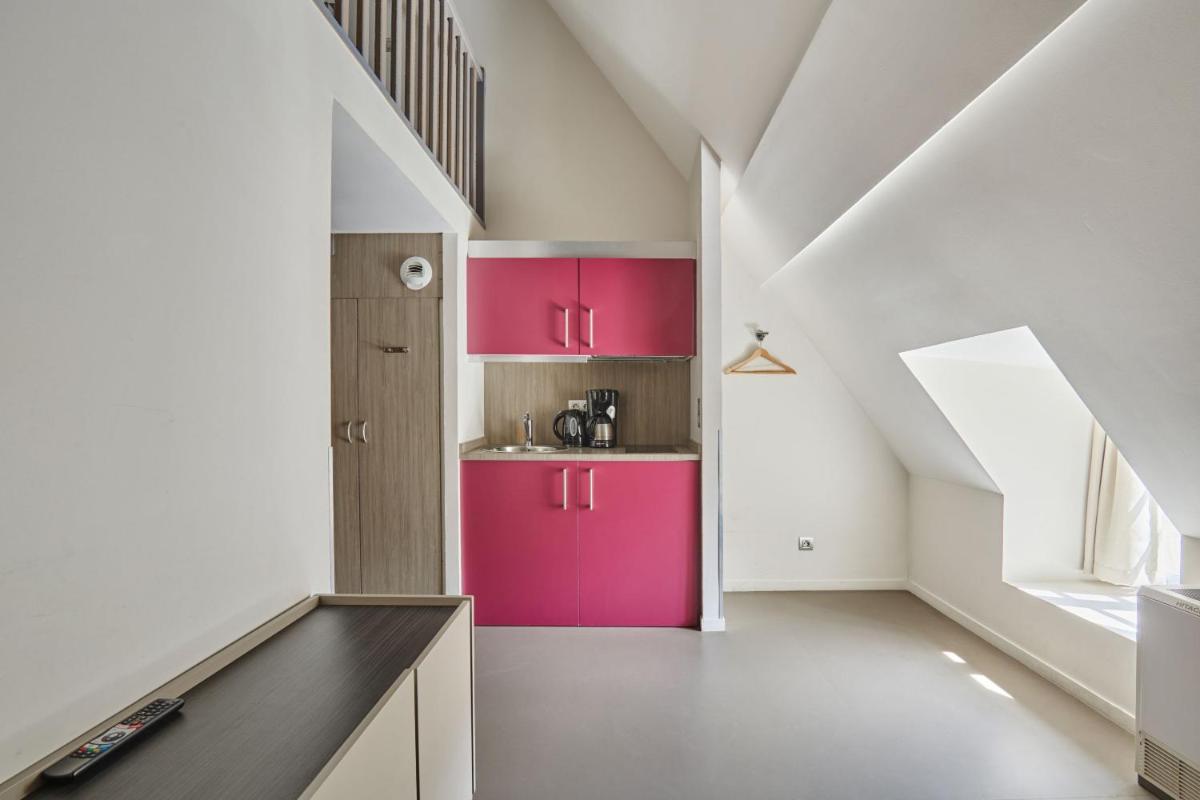 Cuisine ou kitchenette dans l'établissement Appart'hôtel Odalys City - Dijon Centre Les Cordeliers