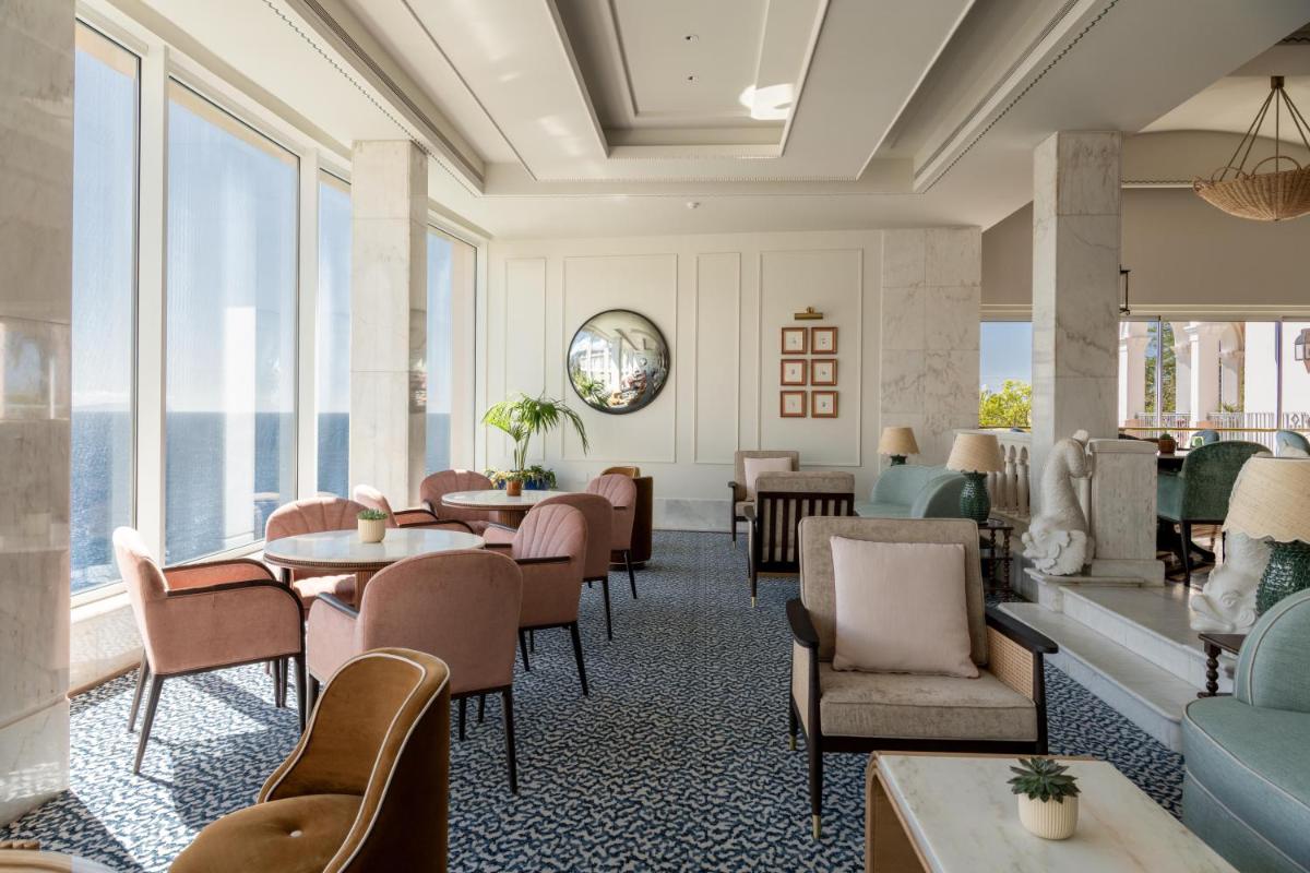 Uma área de estar em Reid's Palace, A Belmond Hotel, Madeira