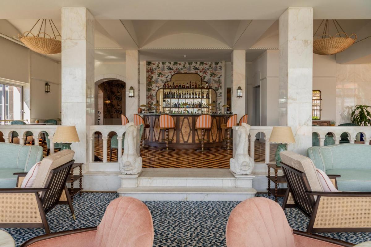 Uma área de estar em Reid's Palace, A Belmond Hotel, Madeira