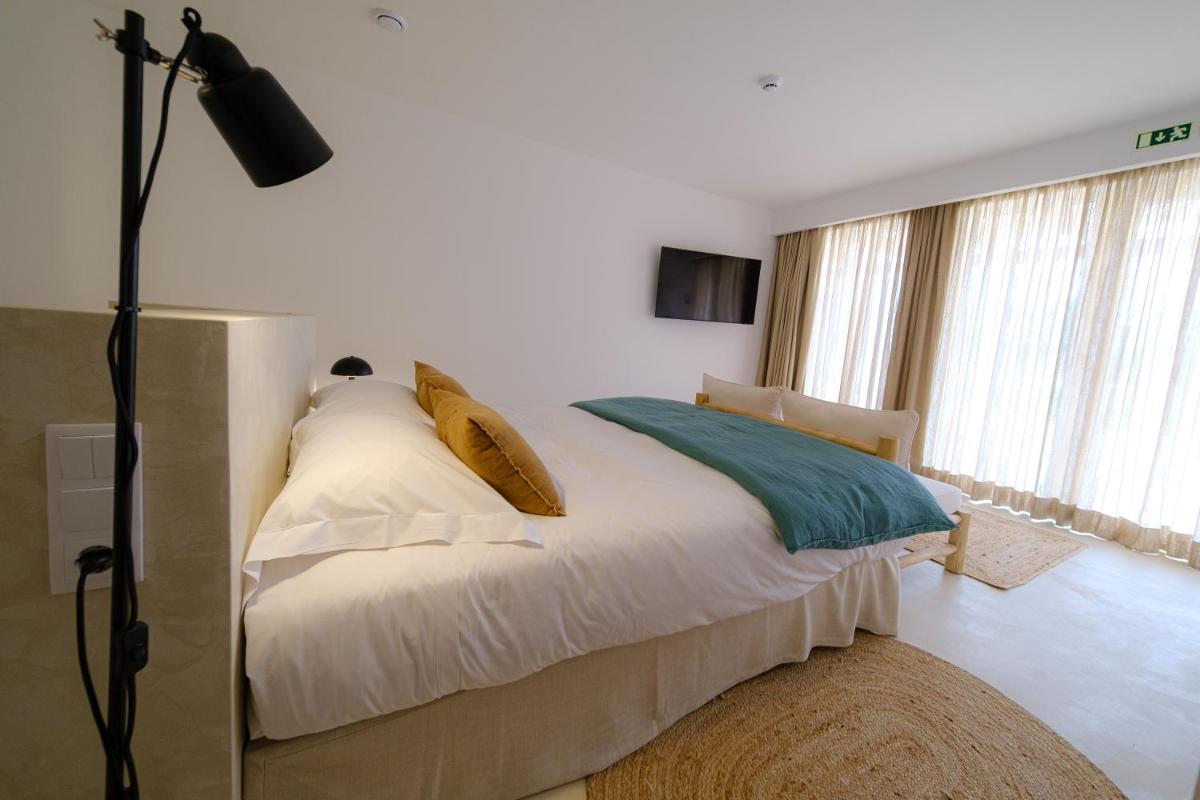 Uma cama ou camas num quarto em Sorraia Hotel Rural