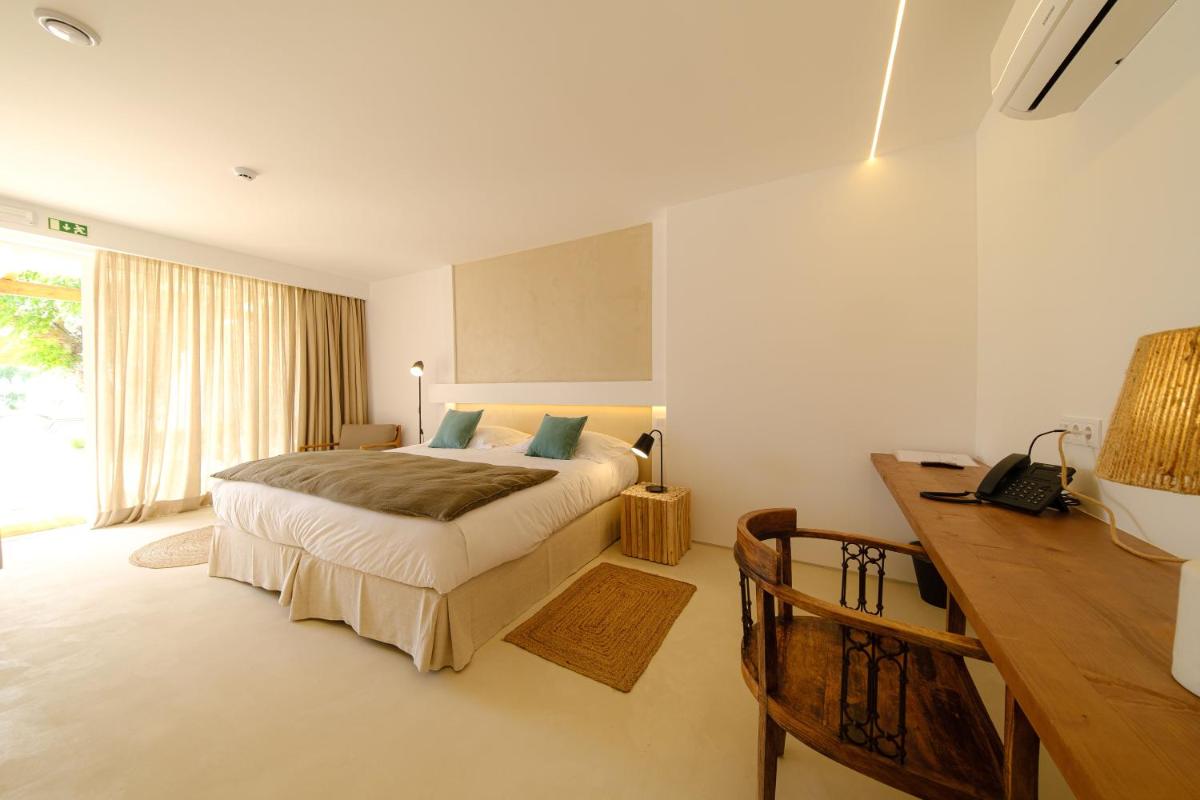 Uma cama ou camas num quarto em Sorraia Hotel Rural