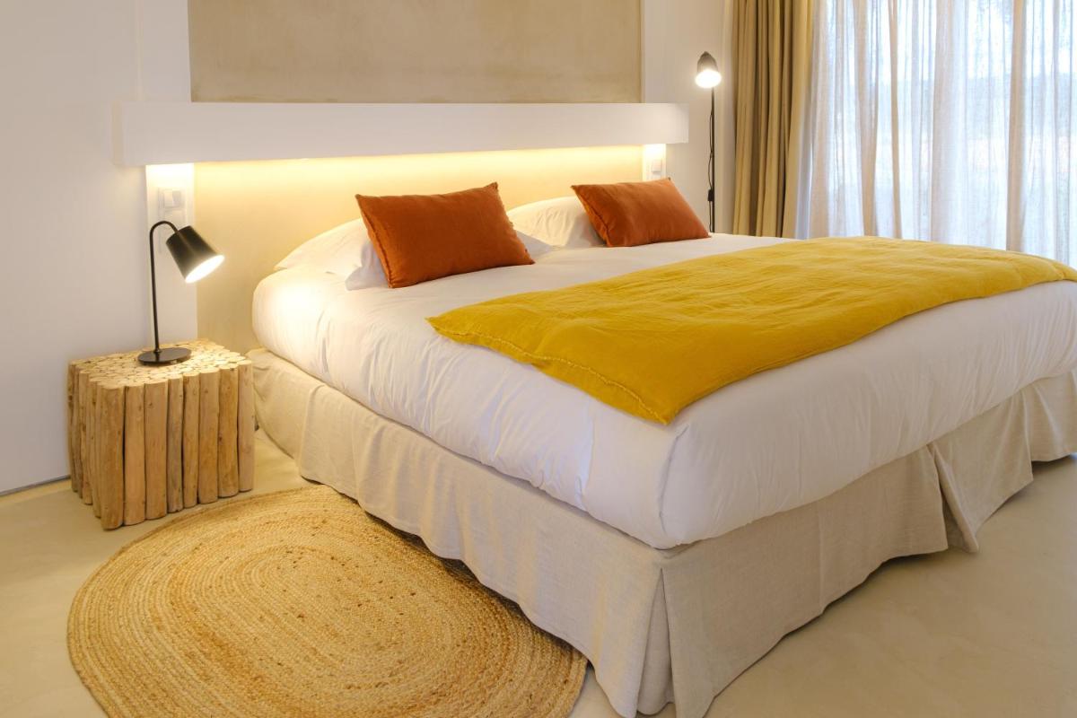Uma cama ou camas num quarto em Sorraia Hotel Rural