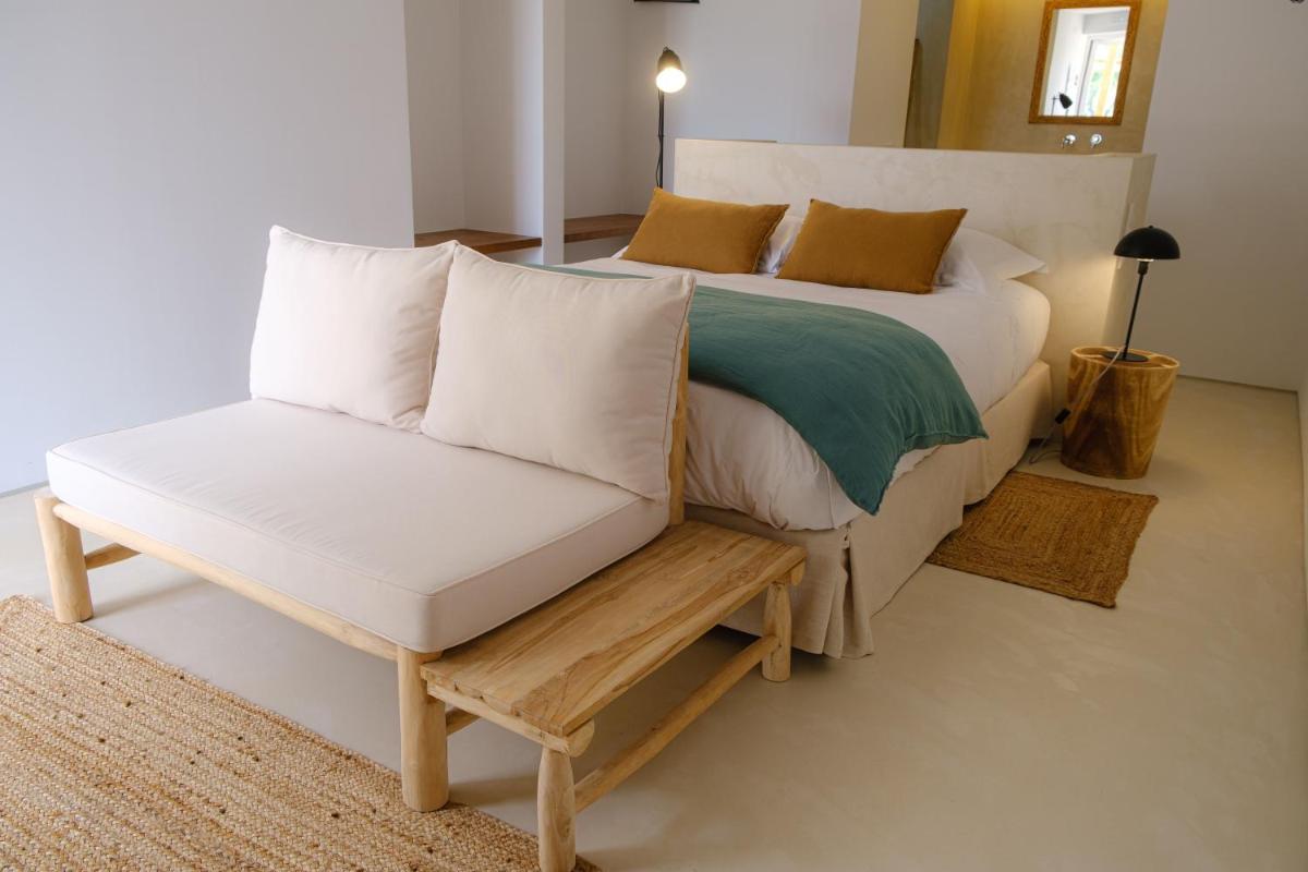 Uma cama ou camas num quarto em Sorraia Hotel Rural