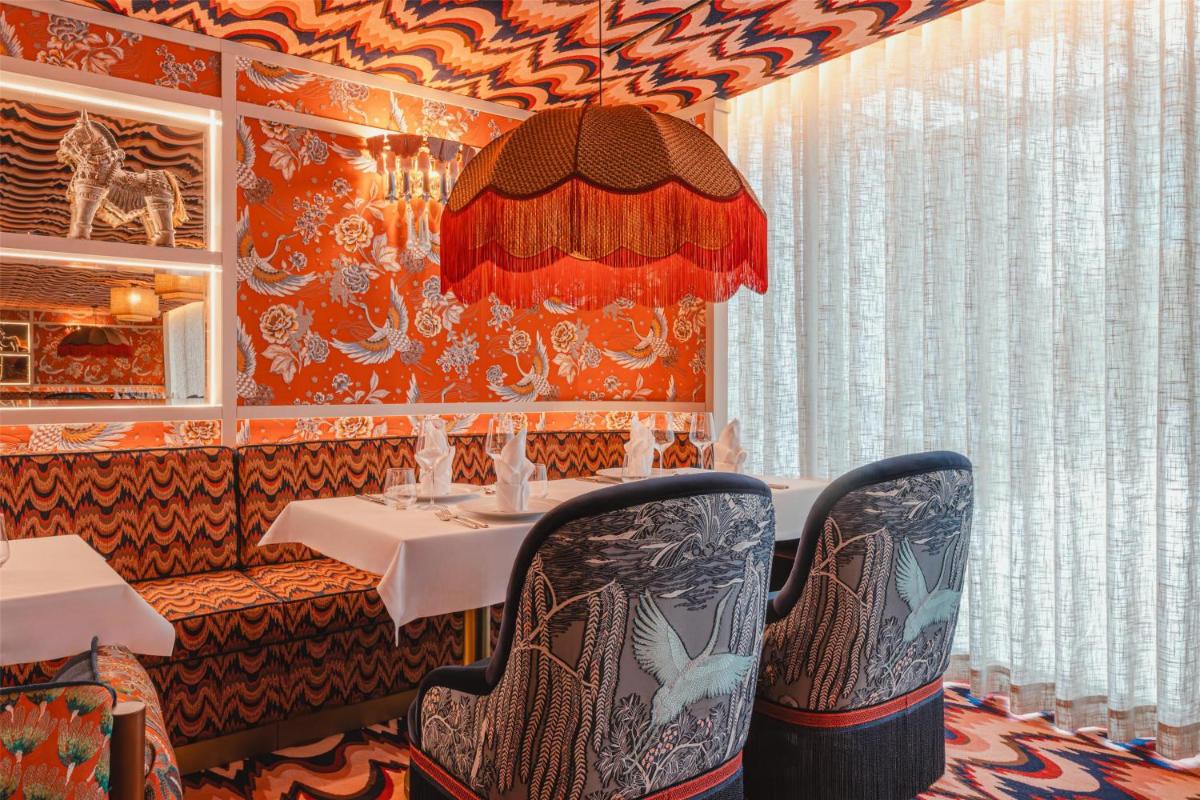 Uma área de estar em Legacy Hotel Cascais, Curio Collection By Hilton
