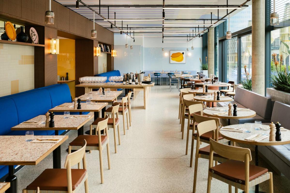 Ein Restaurant oder anderes Speiselokal in der Unterkunft Kimpton Main Frankfurt by IHG