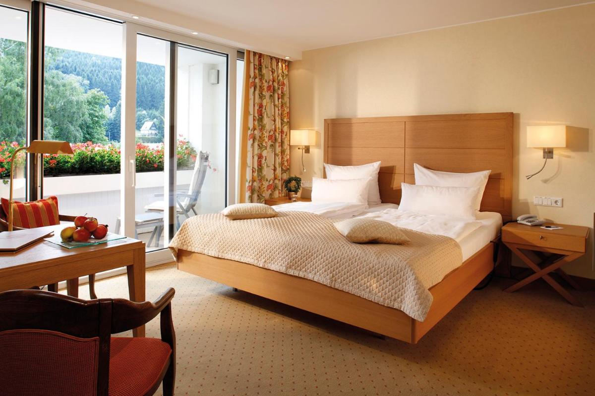 Ein Bett oder Betten in einem Zimmer der Unterkunft Hotel Deimann