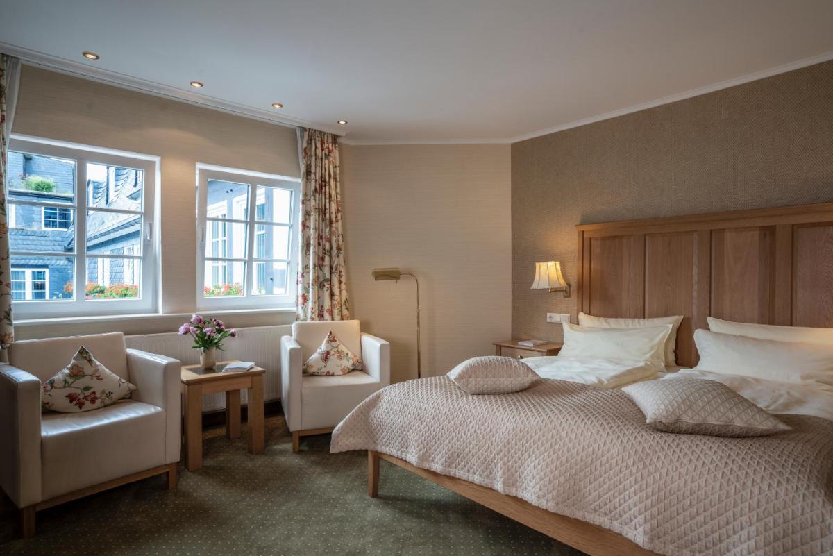 Ein Bett oder Betten in einem Zimmer der Unterkunft Hotel Deimann