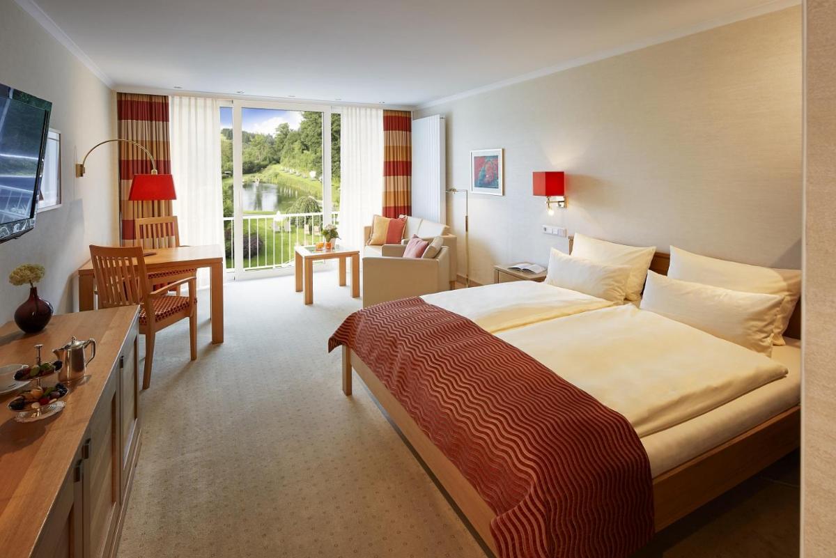 Ein Bett oder Betten in einem Zimmer der Unterkunft Hotel Deimann