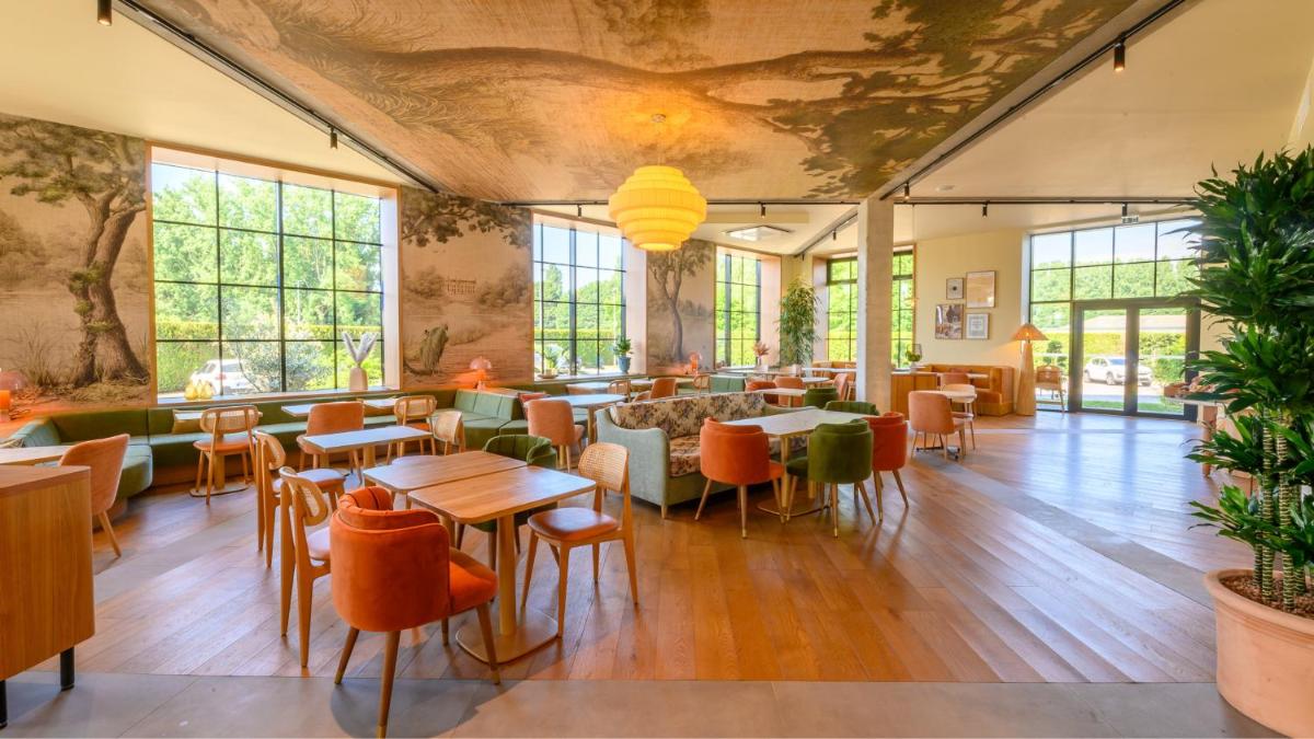 Restaurant ou autre lieu de restauration dans l'établissement Kyriad Prestige Compiègne Hotel & Spa