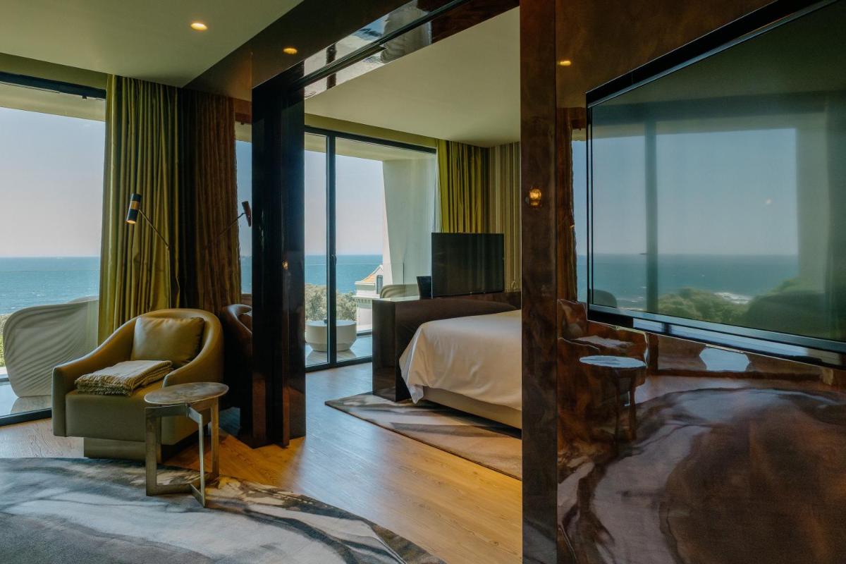 Uma cama ou camas num quarto em Vila Foz Hotel & SPA - member of Design Hotels