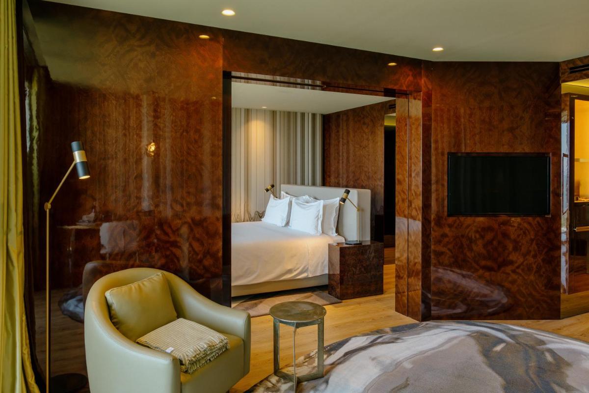 Uma cama ou camas num quarto em Vila Foz Hotel & SPA - member of Design Hotels