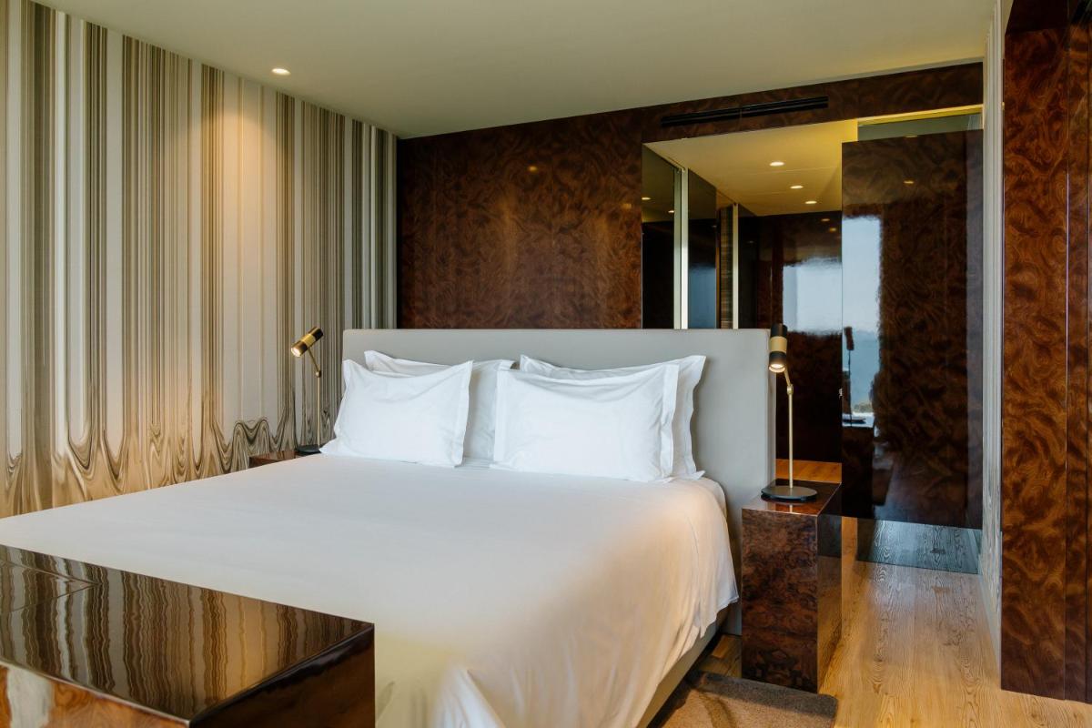 Uma cama ou camas num quarto em Vila Foz Hotel & SPA - member of Design Hotels