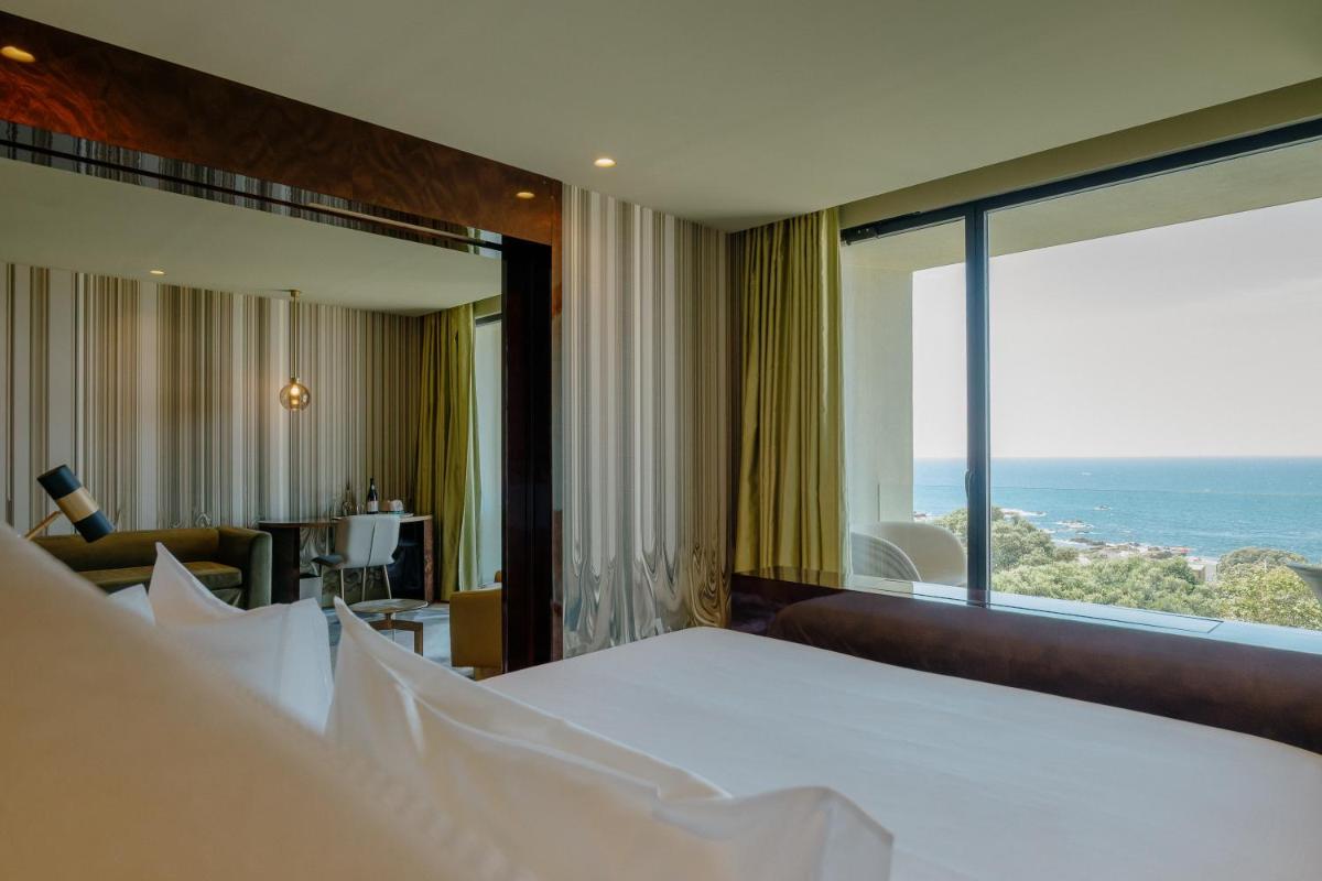 Uma cama ou camas num quarto em Vila Foz Hotel & SPA - member of Design Hotels