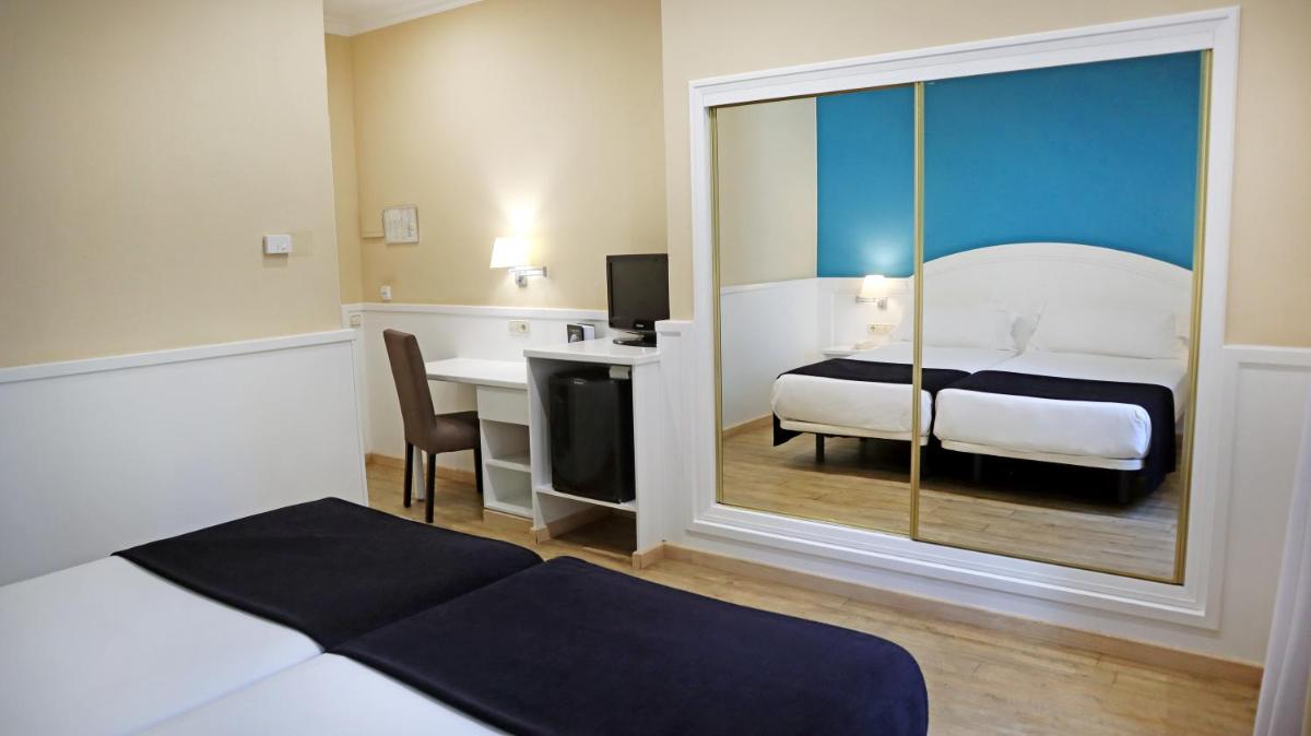 Cama o camas de una habitación en 1881 Hotel Balneario Vichy Catalan