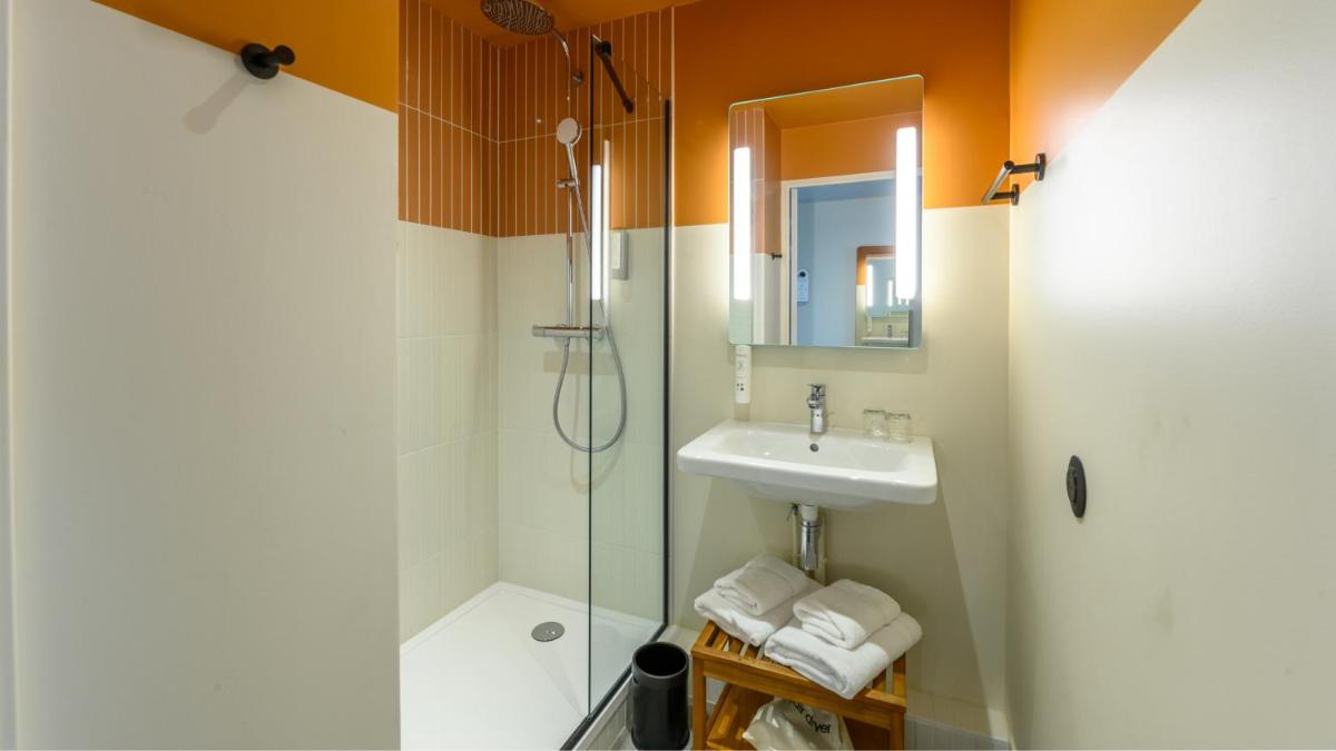 Salle de bains dans l'établissement Kyriad Prestige Compiègne Hotel & Spa