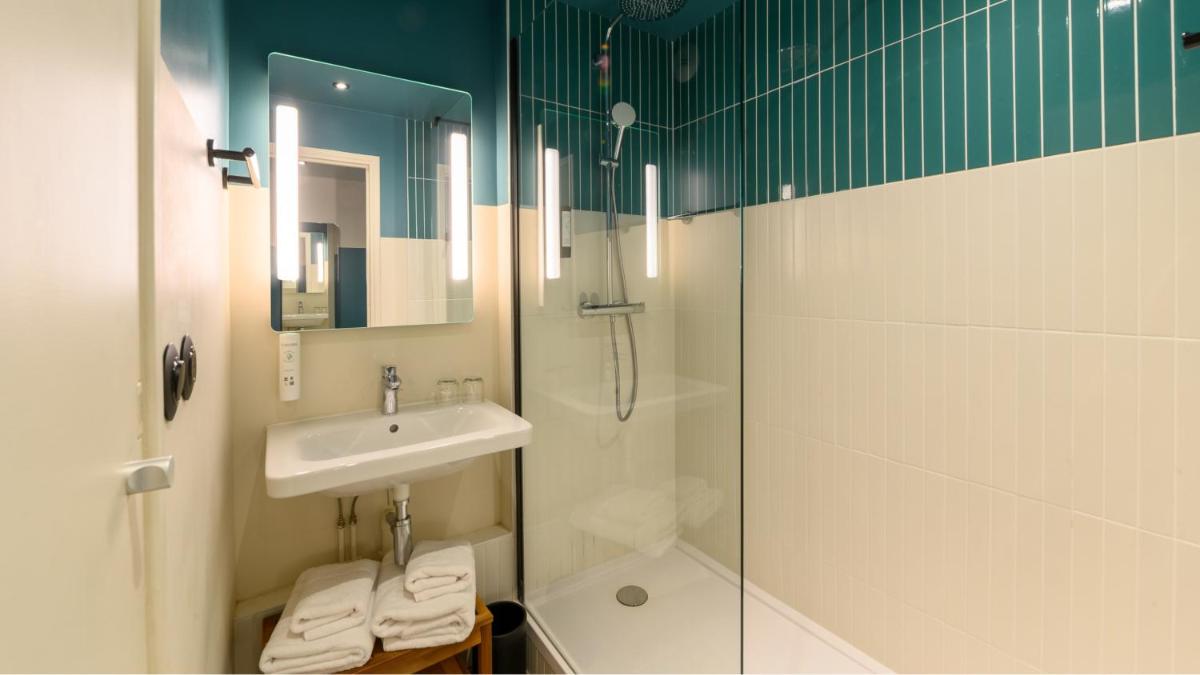 Salle de bains dans l'établissement Kyriad Prestige Compiègne Hotel & Spa