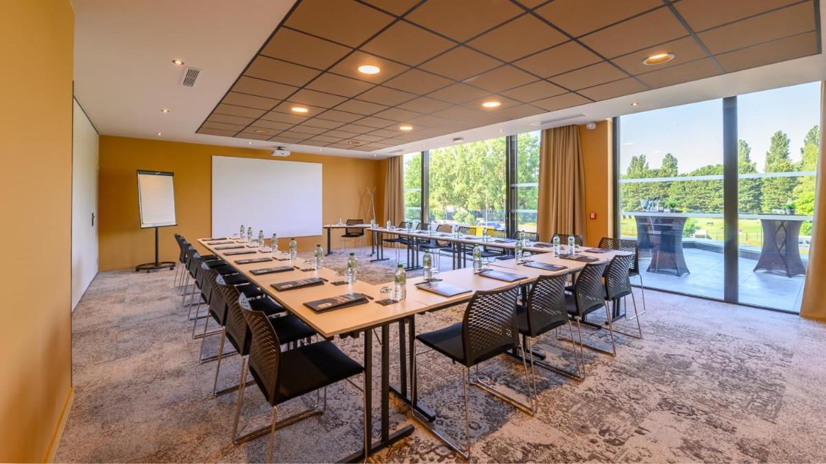 Restaurant ou autre lieu de restauration dans l'établissement Kyriad Prestige Compiègne Hotel & Spa