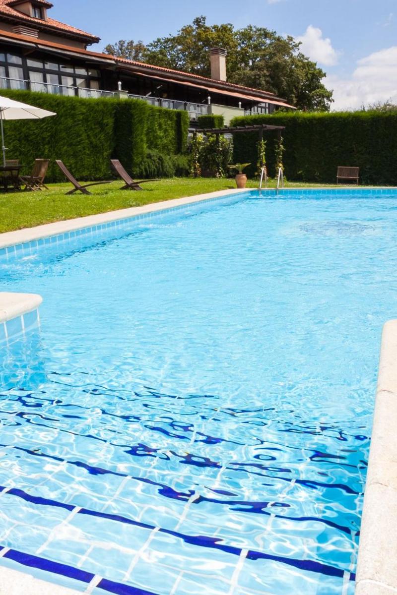 Piscina en o cerca de Hosteria de Torazo Nature Hotel & Spa