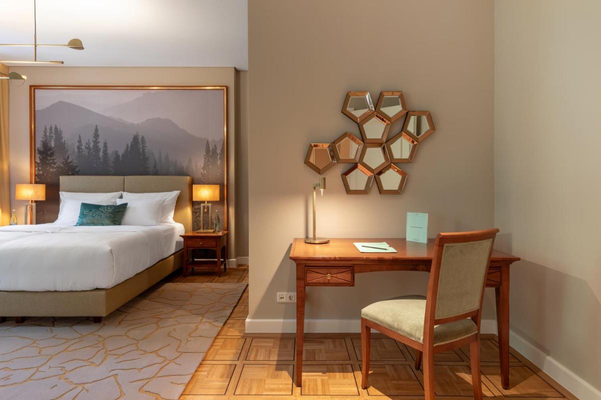 Ein Bett oder Betten in einem Zimmer der Unterkunft Falkenstein Grand, Autograph Collection Ein Bett oder Betten in einem Zimmer der Unterkunft Falkenstein Grand, Autograph Collection