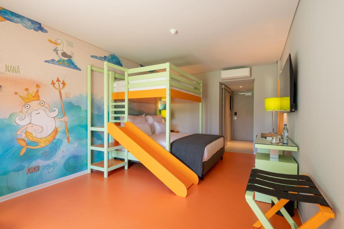 Uma cama ou camas num quarto em Vila Gale Collection Ponte de Lima