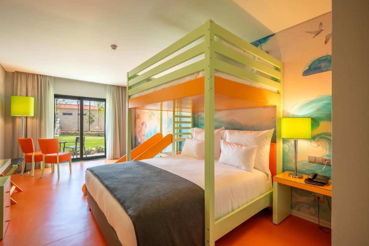 Uma cama ou camas num quarto em Vila Gale Collection Ponte de Lima