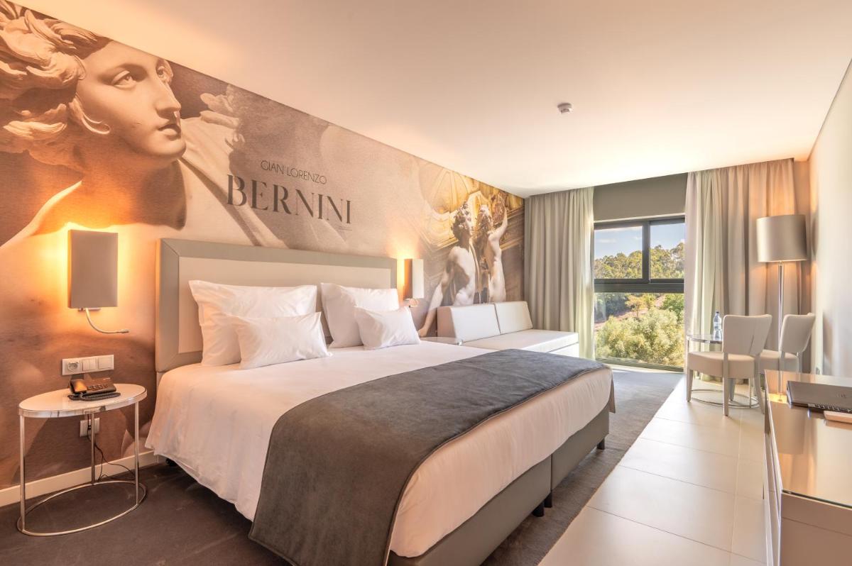 Uma cama ou camas num quarto em Vila Gale Collection Ponte de Lima